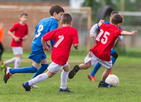 children's emergency dentist miami | kids playing soccer