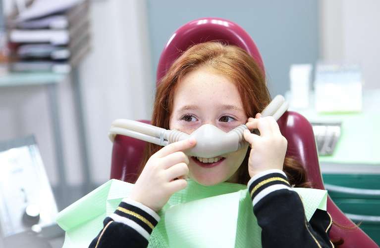 childrens sedation dentisty miami | child at dentist