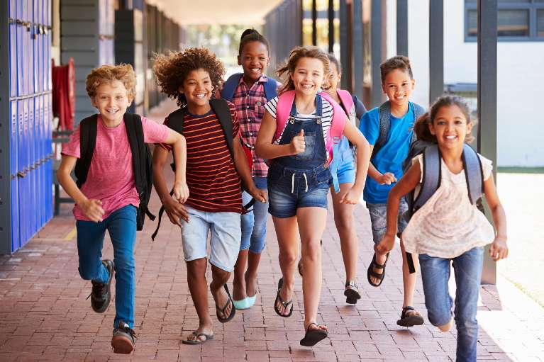 childrens tooth extractions miami | kids running at school